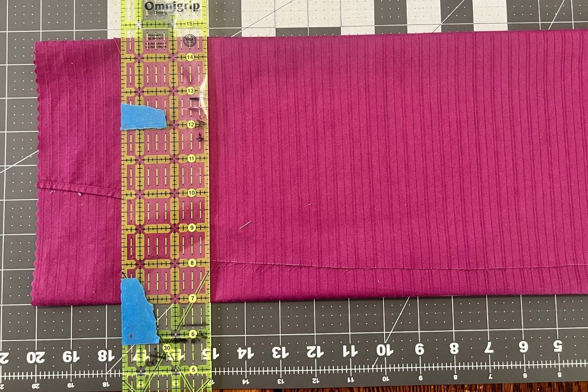 Fabric being measured with a ruler