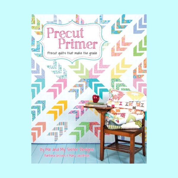 book-PrecutPrimer Cover of “Precut Primer” by Barbara Groves and Mary Jacobson. Beginner quilting book with 12 patterns using various fabric precuts like charm packs and jelly rolls.